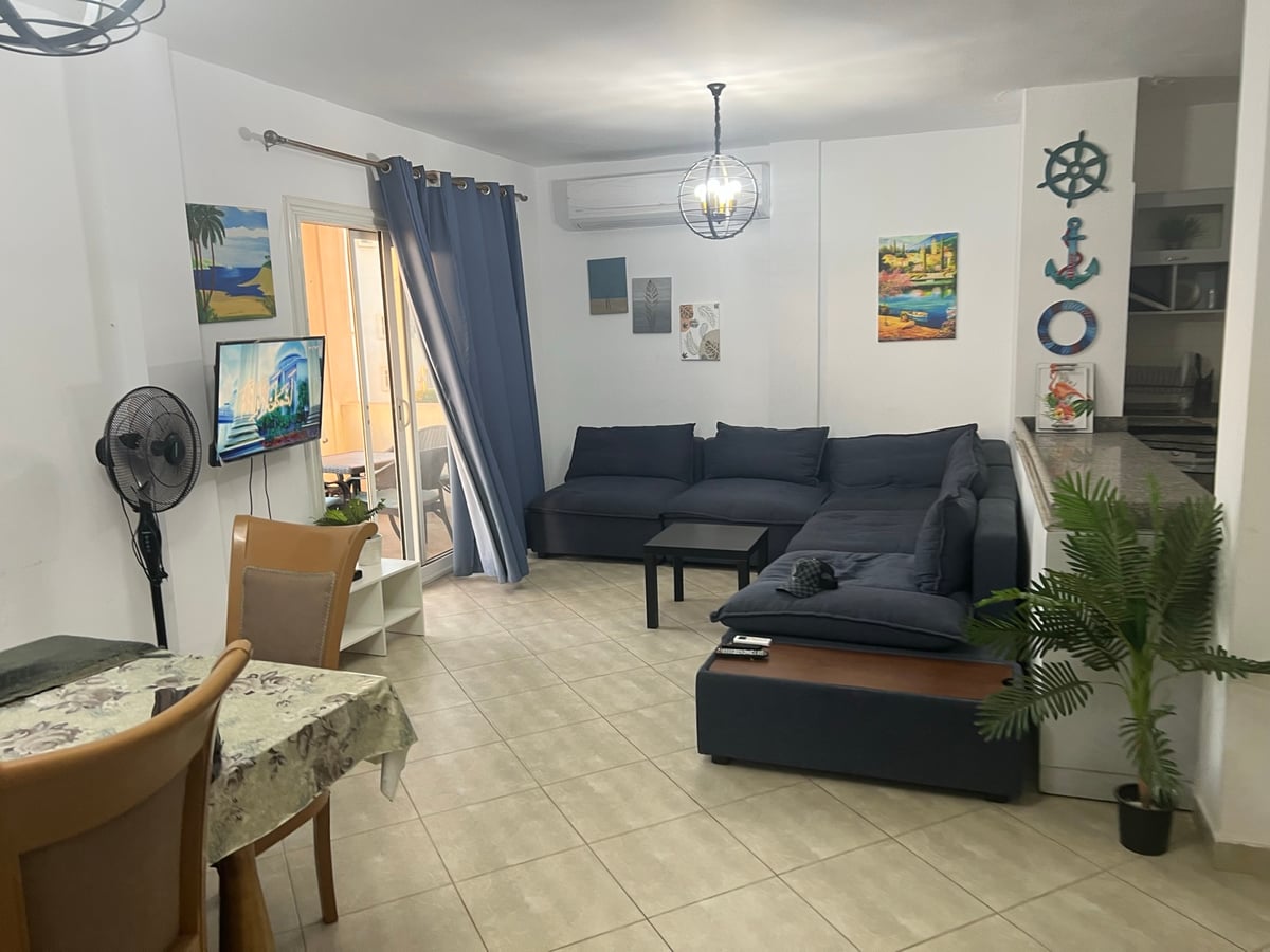 Triplex  4 rooms  4 bathrooms  3 floors  First floor reception, kitchen, travel, photo 2